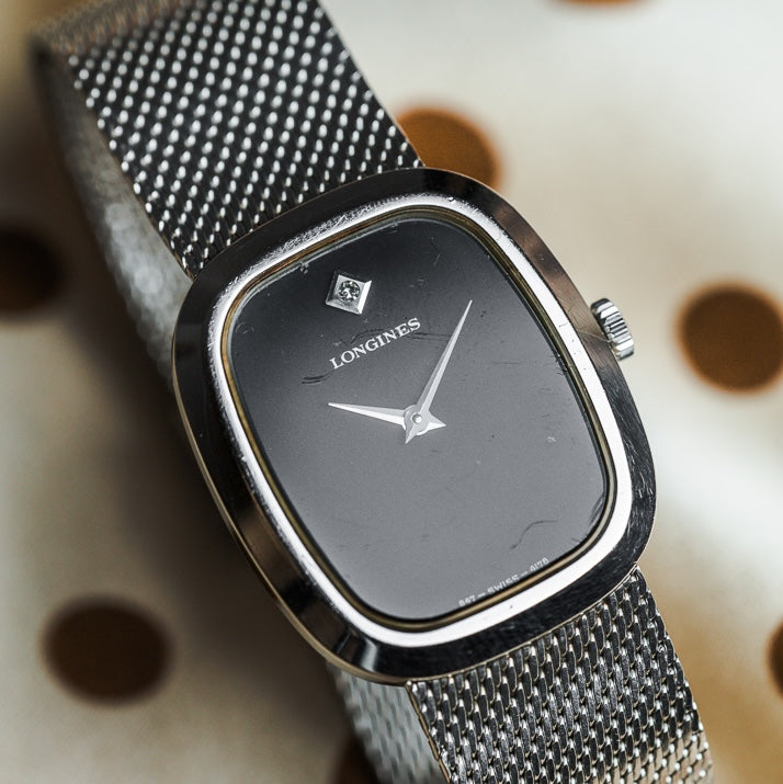 
Longines Ellipse montre vintage acier