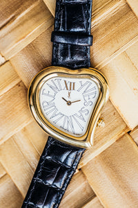 
Yves Saint Laurent Cœur montre vintage plaqué or