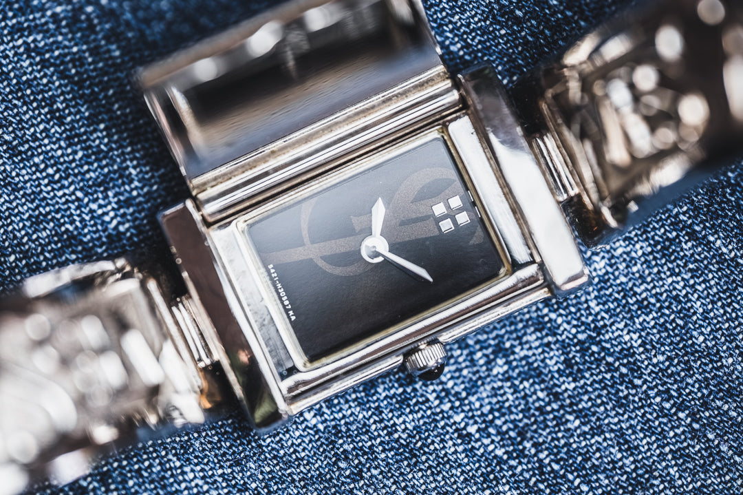 
Yves Saint Laurent "Clapet" montre vintage acier